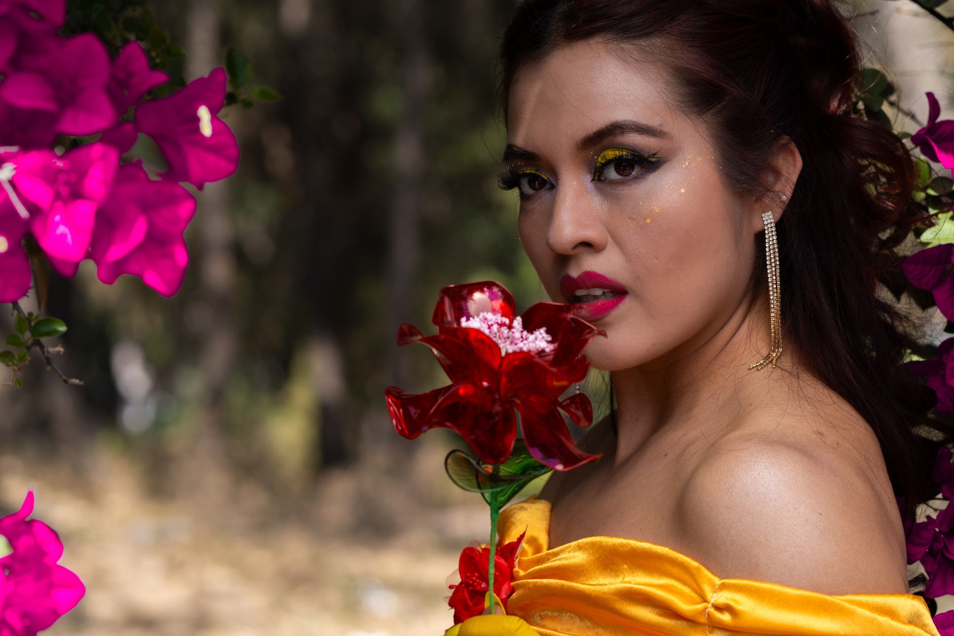 Woman in princess costume holding a flower, surrounded by vibrant blooms outdoors. — Xlbet ilmaisvedot: Expert Guide for Onli